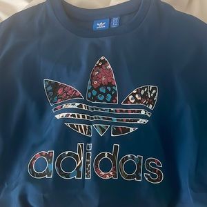 100%polyester adidas long sleeve shirt! Super lightweight material. Worn once